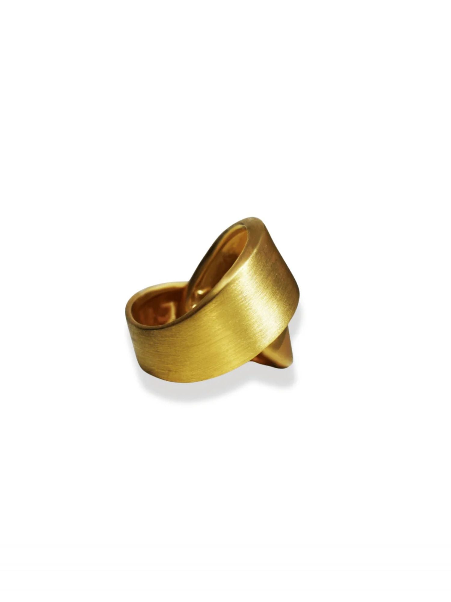 Matte finish gold ribbon ring showing sculptural form on white background